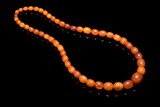 A NATURAL AMBER BEAD NECKLACE
