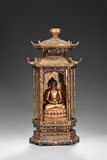 A GILT-BRONZE BUDDHIST SHRINE WITH SEATED BUDDHA