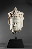 A MARBLE CARVED HEAD OF BODHISATTVA