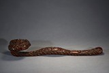 A VERY LARGE CARVED FIGURES RUYI SCEPTER