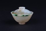 A NATURAL JADEITE BOWL WITH COVER