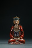 A FAMILLE ROSE FIGURE OF SEATED GUANYIN