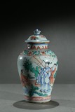 A WUCAI 'FIGURES' VASE WITH COVER