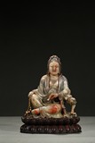 A PAINTED SHOUSHAN CARVING OF GUANYIN