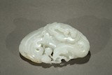 A WHITE JADE 'PHOENIX AND CHILONG' WASHER