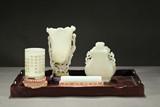 A GROUP OF FOUR WHITE JADE VESSELS