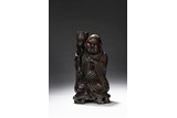 A ROSEWOOD CARVING OF MONK