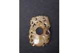 A CELADON JADE RETICULATED 'CHILONG' PENDANT