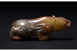 A YELLOW JADE CARVED MYTHICAL BEAST