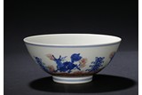 AN UNDERGLAZE RED BLUE AND WHITE 'QILIN' BOWL