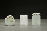 A GROUP OF THREE WHITE JADE ORNAMENTS