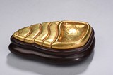 A GILT-BRONZE PALETTE WITH STAND