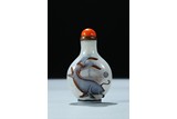 A WHITE AND CARAMEL OVERLAY GLASS 'FISH' SNUFF BOTTLE