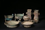 A SET OF EIGHT ARCHAIC BRONZE VESSELS