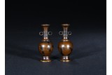 A PAIR OF SMALL BRONZE INCENSE HOLDERS