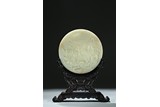 A WHITE JADE TWO SIDE 'SAGES AND BOAT' CIRCULAR TABLE SCREEN