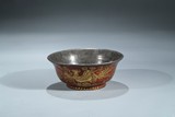 A RED LACQUERED AND GILT PAINTED 'PHOENIX' SILVER BOWL