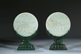 A PAIR OF FINE WHITE JADE 'CRANE AND DEER' CIRCULAR TABLE SCREEN WITH GREEN JADE STANDS