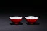 A PAIR OF RED GLAZED BOWLS