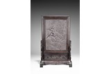A DUANSTONE CARVED 'FIGURES AND LANDSCAPE' TABLE SCREEN