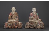 A PAIR OF LARGE POLYCHROME CLAY ARHAT FIGURES