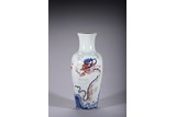 AN UNDERGLAZE BLUE AND COPPER RED 'DRAGON' VASE