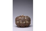 A SILVER REPOUSSE 'HUNDRED BOYS' MELON-SHAPED BOX AND COVER