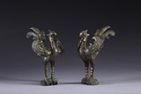A PAIR OF GOLD AND SILVER INLAID BRONZE PHOENIXES