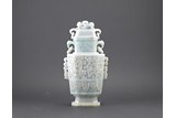 A JADEITE CARVED 'KUI DRAGON' VASE AND COVER