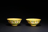 A PAIR OF GREEN AND YELLOW-GLAZED BOWLS