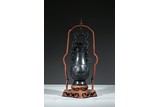 A BLACK JADE HANGING VASE AND COVER