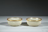 A PAIR OF CARVED WHITE JADE BOWLS