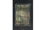 AN ARCHAIC BRONZE TABLET WITH INSCRIPTIONS