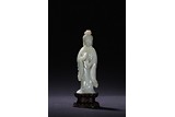 A WHITE JADE FIGURE OF STANDING GUANYIN