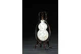 A WHITE JADE DOUBLE GOURD 'LANDSCAPE AND FIGURES' PENDANT 