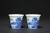 A PAIR OF BLUE AND WHITE WINE CUPS
