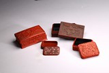A GROUP OF FOUR CINNABAR LACQUER BOXES