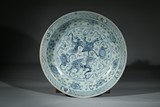 A BLUE AND WHITE 'BUDDHIST LIONS' CHARGER