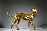 A LARGE GILT BRONZE FIGURE OF HOUND WITH MARK