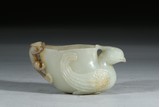 A WHITE JADE 'PHOENIX AND CHILONG' CUP