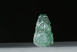 A JADEITE CARVED DOUBLE GOURD PENDANT