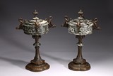 A PAIR OF FRENCH NEO-GOTHIC LIDDED URNS