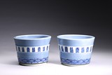 A PAIR OF BLUE AND WHITE 'FU SHOU' JARDINIERES 