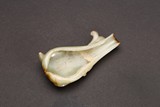 A SMALL JADE CARVED WASHER 