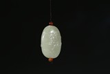 A WHITE JADE 'CHILONG' OVOID PENDANT
