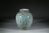 A FAMILLE ROSE TURQUOISE GREEN GROUND 'LOTUS SCROLL' JAR