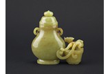 A YELLOW JADE CARVED 'CHILONG' JOINED VESSEL