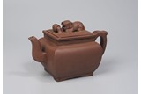 A CHINESE YIXING TEAPOT AND COVER