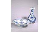 A BLUE AND WHITE 'LOTUS' VASE AND DISH