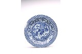 A BLUE AND WHITE 'FIGURINES STORY' DISH